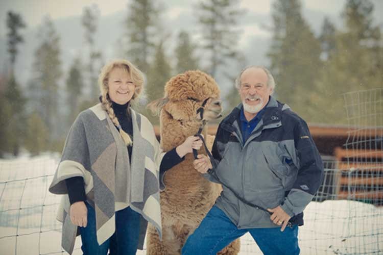 The owners of Terbest Alpacas with one of their alpacas